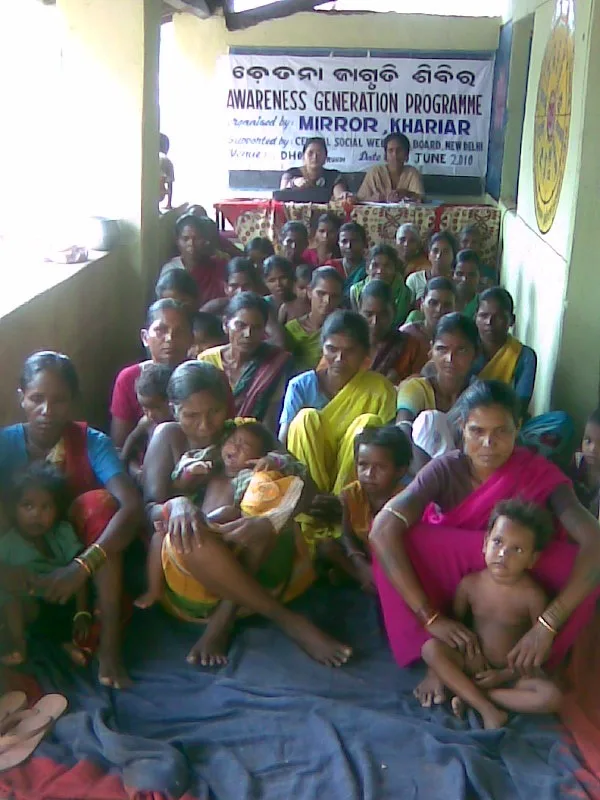 Women and children attending an awareness generation programme