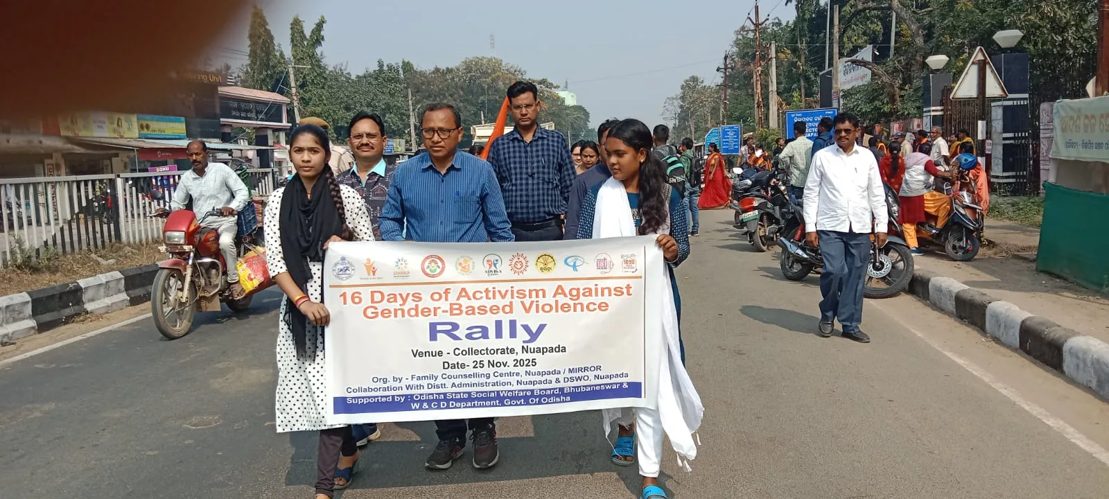 Community members taking part in a rally against gender-based violence
